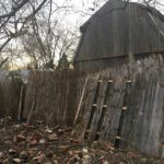 dump of old fence, bricks and concrete